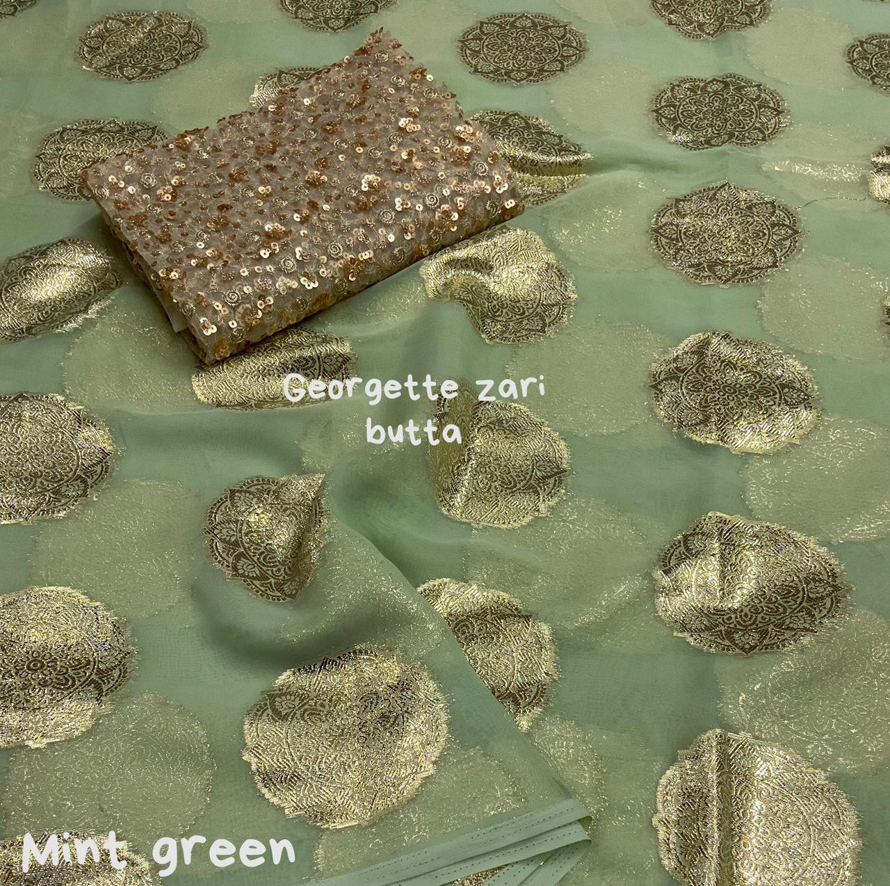 Pure Georgette Saree with gold zari weaving motifs - Mint Green