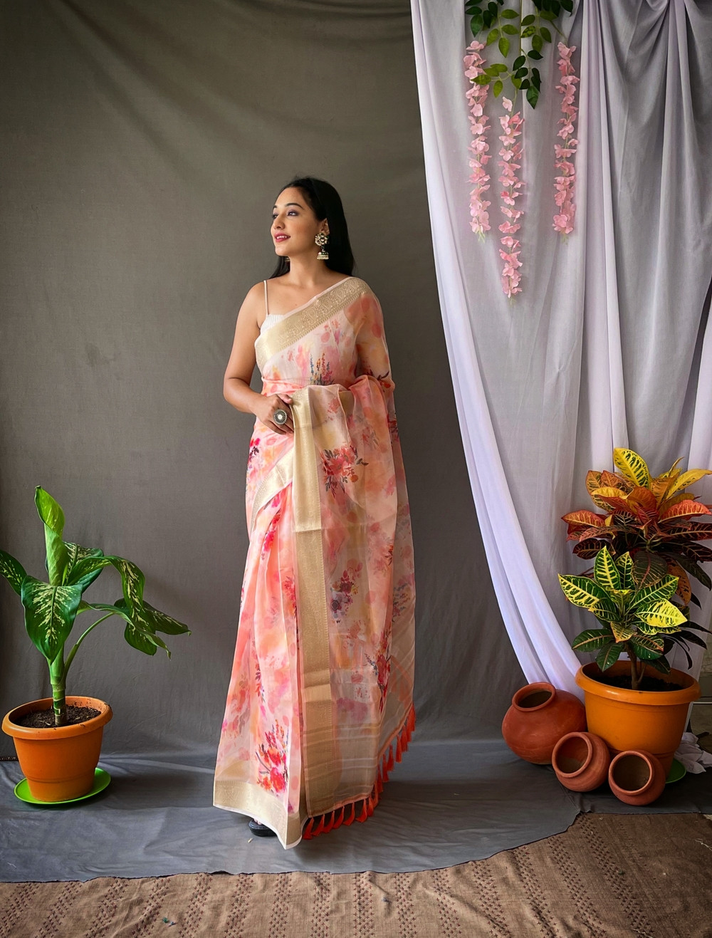 Organza floral printed saree with zari pallu & jacquard border- Peach